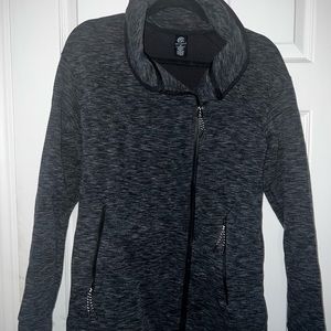 Black and gray Champion athletic jacket.